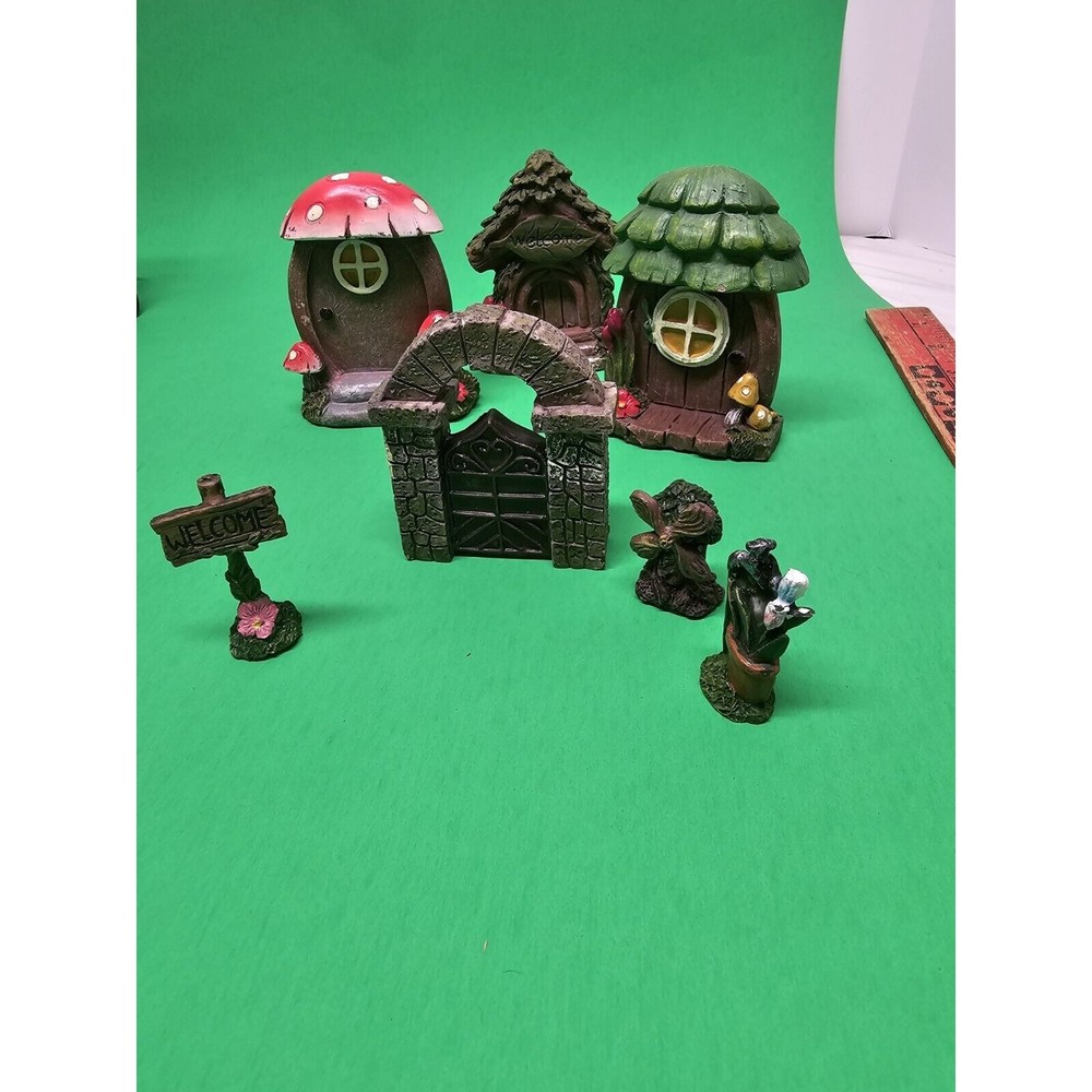 Fairy Village Seven Pieces Three Huts,  one gate, three lawn ornaments